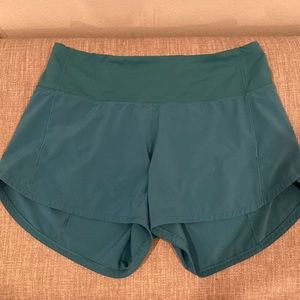 Lululemon high waisted turquoise shorts, size 4, 4” inch